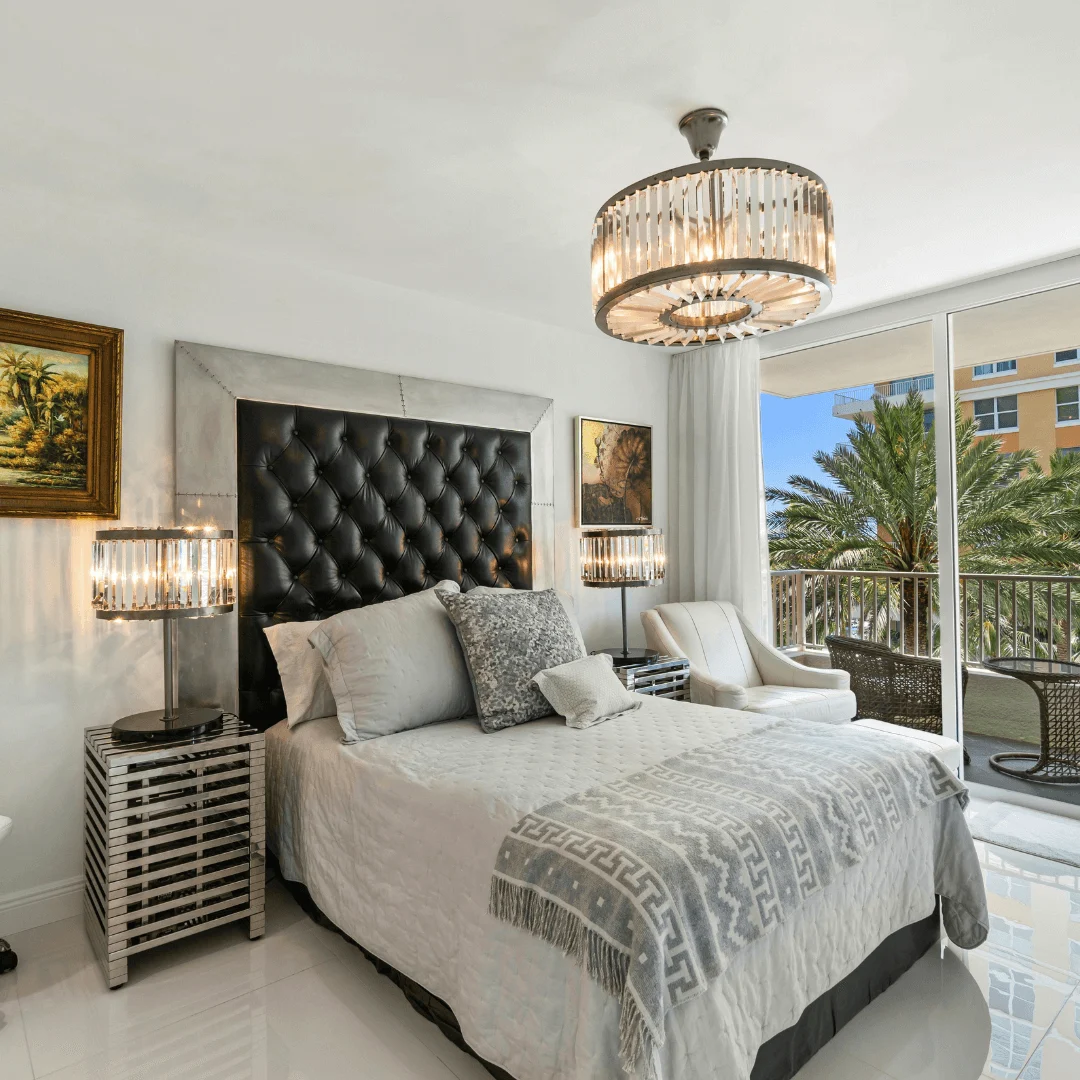 Modern Bedroom Setup with Panelled Headboard and Soft Decor.