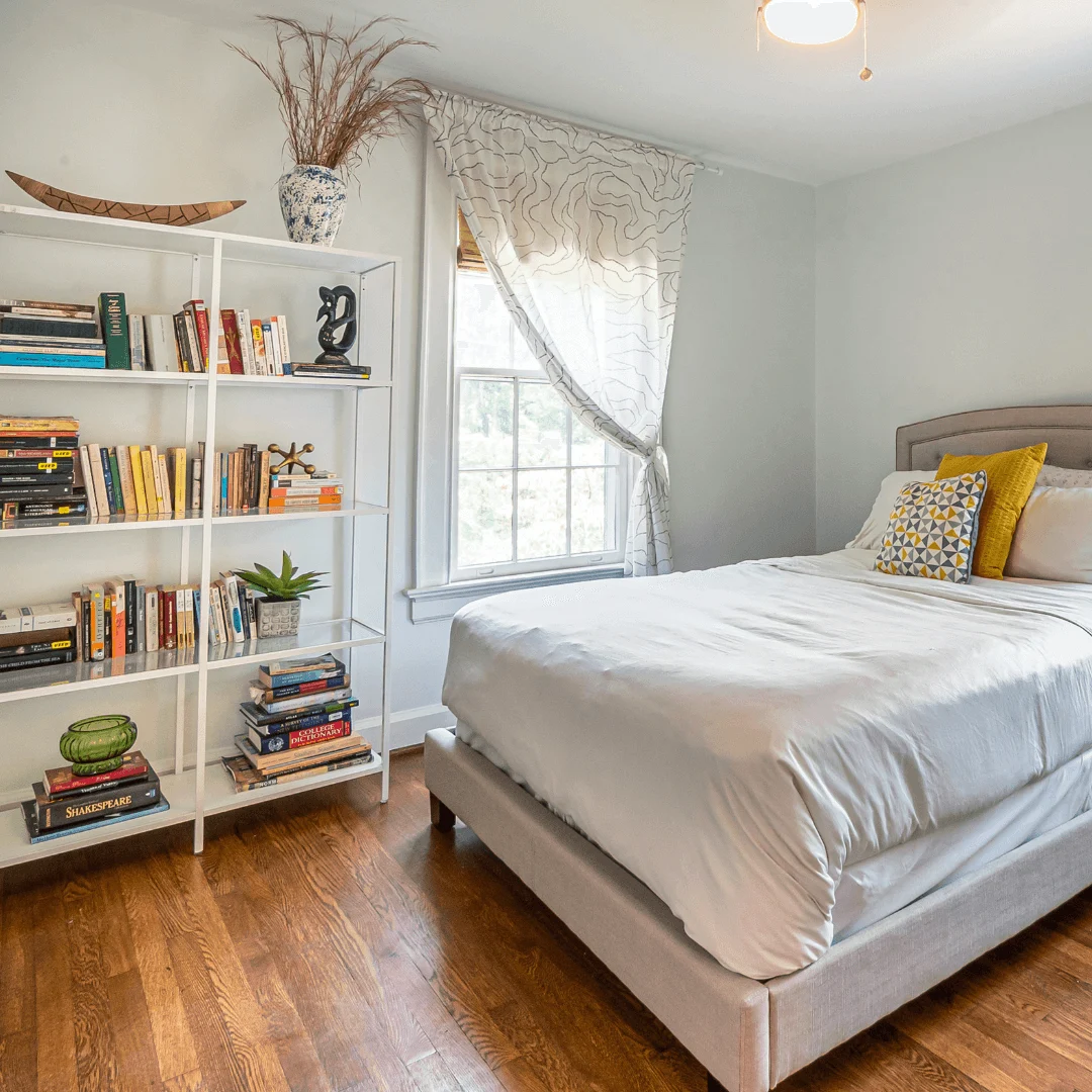 Contemporary Guest Bedroom with Marble Panel and Sleek Wardrobe.