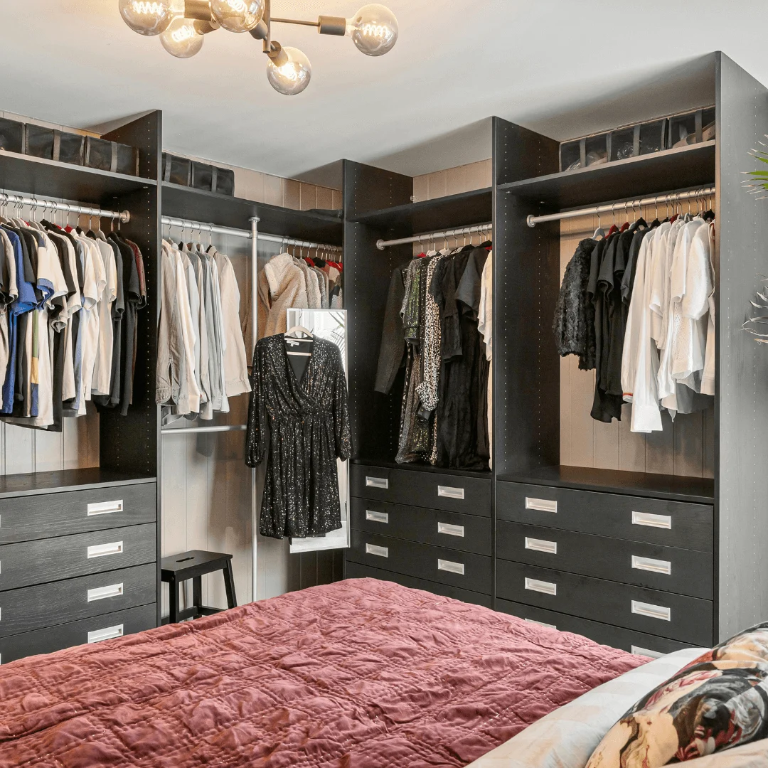 Minimalist Grey Wardrobe with Vertical Handles and Soft Lighting Inside