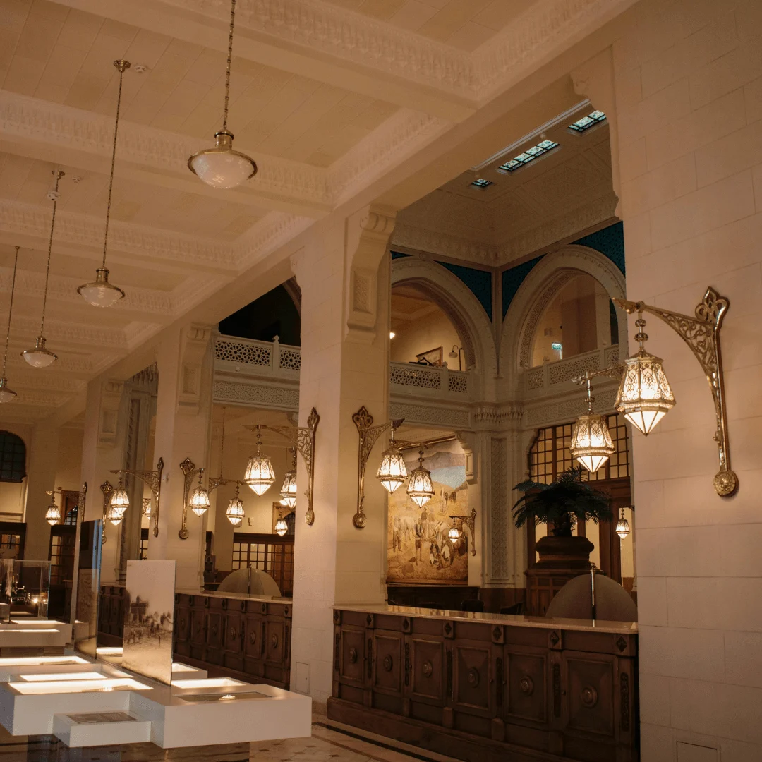 Traditional False Ceiling with Jaali Patterns and Brass Fixtures